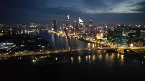4k drone hyperlapse of  ho chi minh city during the night skyscrappers skyine Stock Footage 204005356