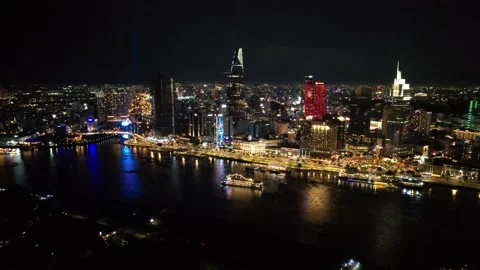 4k drone hyperlapse of  ho chi minh city during the night skyscrappers skyine Stock Footage 204005571