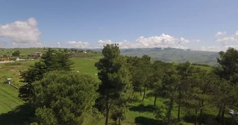 4k drone landscape shot above landscape at summer in Italy with mountains Stock Footage 71352333