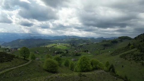 4K drone linear flight over mountain village – scenic rural landscape Stock Footage 344540565