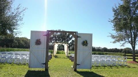 4K Drone long shot through wedding arches Stock Footage