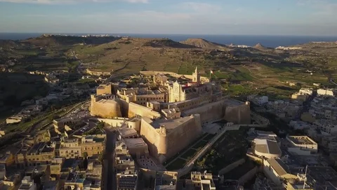 4k Drone - Medieval fortress, Gozo Citadel, at sunset.  Castle located in Malta. Stock Footage 83147053
