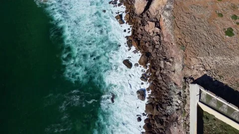 4K Drone. ocean waves rocky cliffs sandy coast, beach Portugal 20 april 2023 Stock Footage 239101836