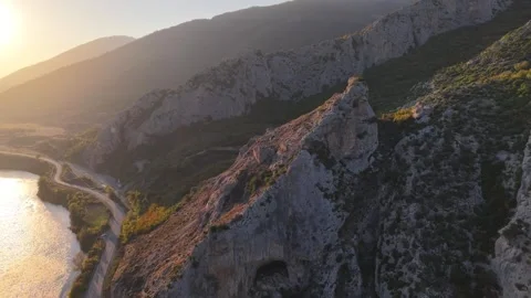 4K Drone Orbit Around Ancient Castle Revealing Sunset and River Stock Footage 337245307