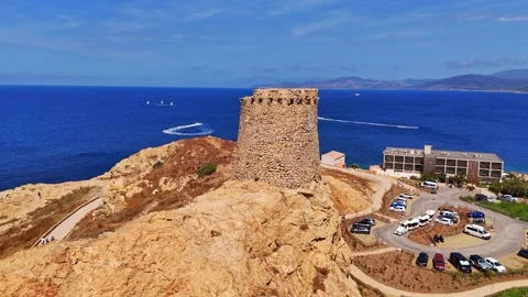 4K Drone Orbit Around Historic Coastal Tower in L'Île-Rousse, Corsica, France Vidéo 306019283