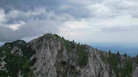 4K drone orbit around mountain peak – cinematic aerial landscape Stock Footage 344545430