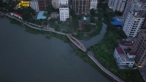 4K Drone Orbit of Modern Urban Skyline and Waterfront in Dhaka City Stock Footage 344695779