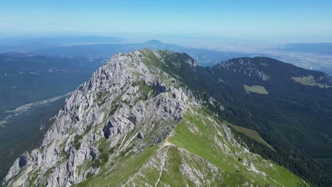 4K drone orbit over mountain ridge – cinematic aerial landscape Stock Footage 343818438