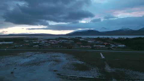 4K Drone Orbit Shot Around Small Iceland Village at Sunrise Vídeo Stock 332657055