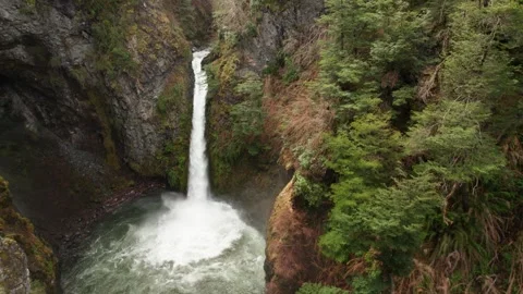 4K drone orbitating over a beautiful waterfall Stock Footage 248999688