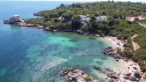 4K drone over crystal blue water, in Alghero Sardinia Stockbeeldmateriaal 323265473