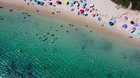 4K drone over crystal blue water, in Alghero Sardinia Stockbeeldmateriaal 323265498