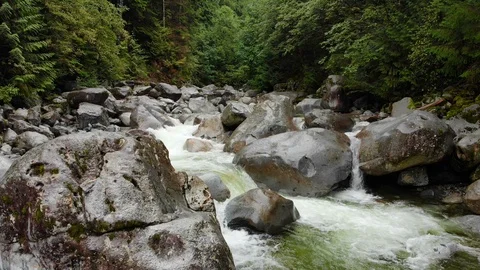 4k drone over mountain stream 動画素材 97092934