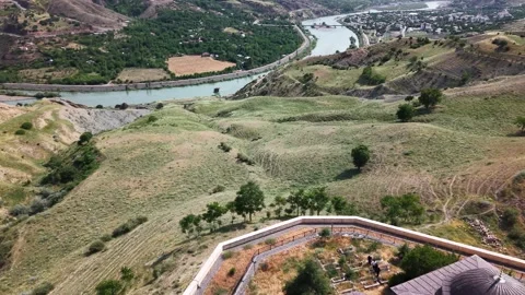 4K Drone Pan From Mosque Toward River Right to Left Stock Footage 336255812
