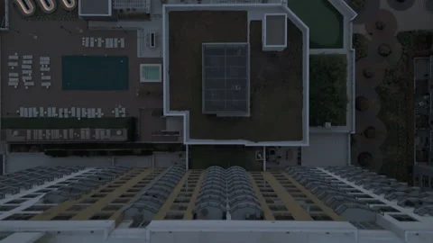 4k drone pointing straight down over high rise apartment building Stock Footage 291229889