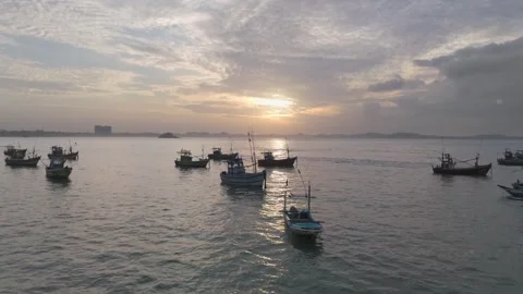4K Drone Push-In and Crane Up of Fishing Boats at Sunrise Harbor Stock Footage 317071322