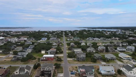 4k Drone rising and revealing OBX sound side Stock Footage 170857504