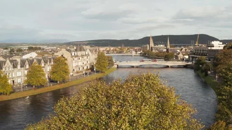 4K Drone Rising from Behind Tree to Reveal Inverness City by River Ness Stock-Footage 285534486