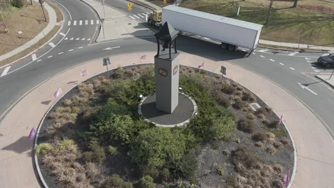 4k drone rotating around traffic circle Stock Footage 289784939