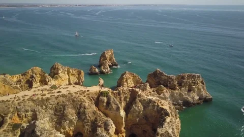 4k drone - Rugged cliffs of Ponta da Piedade.  Algarve region.  Lagos, Portugal. 스톡 동영상 82556076