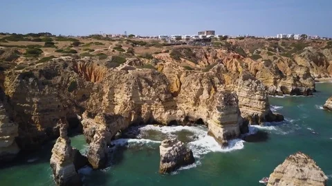 4k drone - Rugged cliffs of Ponta da Piedade.  Algarve region.  Lagos, Portugal. Stock Footage 82556436