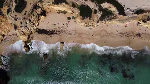 4K Drone - Rugged cliffs, sandy coast ocean Ponta Da Piedade. Algarve. Portugal Stock Footage 239270329