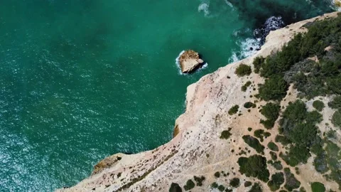 4K Drone. Rugged cliffs, sandy coast ocean Ponta Da Piedade. Algarve. Portugal. Stock Footage 239778905