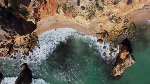 4K Drone. Rugged rocky cliffs, beach, ocean waves . Algarve. Portugal Stock Footage 240127872