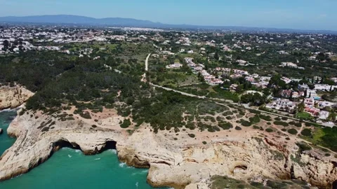 4K Drone. Rugged rocky cliffs, bay ocean waves. Algarve. Portugal 20 april 2023 Stock Footage 240429948
