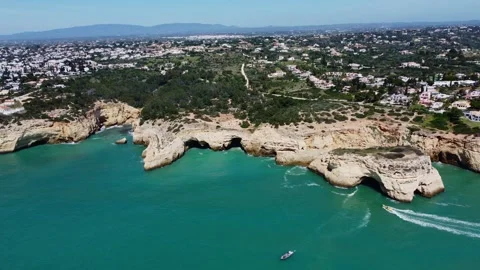 4K Drone. Rugged rocky cliffs, bay ocean waves. Algarve. Portugal 20 april 2023 Stock Footage 240429978