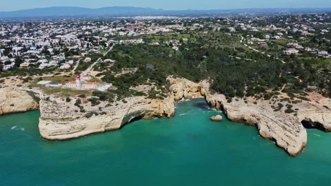 4K Drone. Rugged rocky cliffs, bay ocean waves. Algarve. Portugal 20 april 2023 Stock Footage 240429982