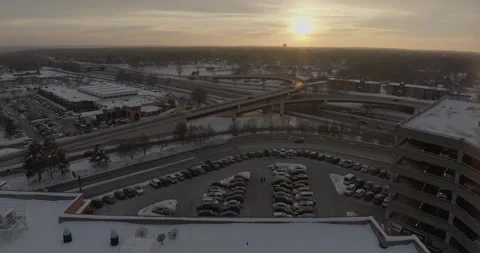 4K Drone Shot of Cedar and Killebrew From Rooftop Facing Sunset Bloomington MN Stock Footage 257416896