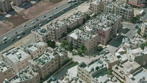 4K Drone shot for developing urban growth and rooftops of Amman suburbs Stock Footage 297232734