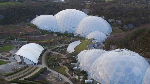 4K drone shot of The Eden Project biomes Stock Footage