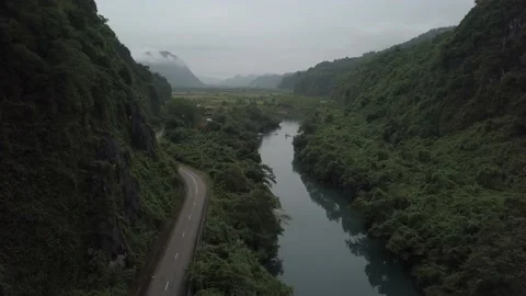 4K Drone shot in flying over the river and road, Vietnam HDR Stock Footage 135951336