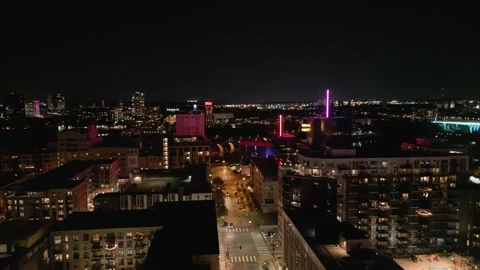 4K Drone Shot Flying Over Rooftops Towards River In Minneapolis At Night Stock Footage 225649442