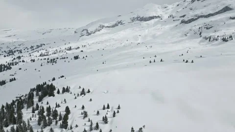 4K Drone Shot Flying Toward Flaine Ski Resort with Chairlifts and Button Lift Video stock 327966841
