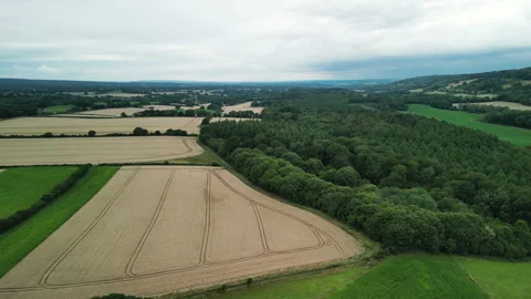 4K Drone Shot Flying Toward Surrey Hills and Dorking Over English Countryside Video stock 328516467