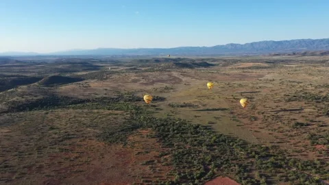 4k drone shot, hot air balloons landing near Sedona, Arizona Stock Footage 283125733