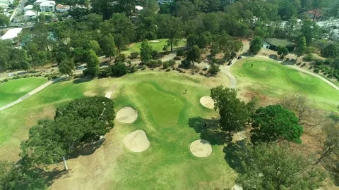 4k drone shot looking over gold course Stock Footage 158591625