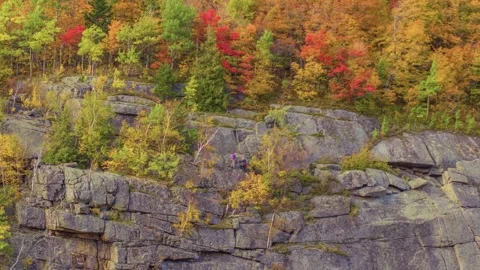 4K Drone Shot of a Mountain Covered in a Fall Forest in Schroon, Adirondack Park Stock Footage 306197144