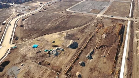 4k Drone shot of a muddy construction site 動画素材 148551790