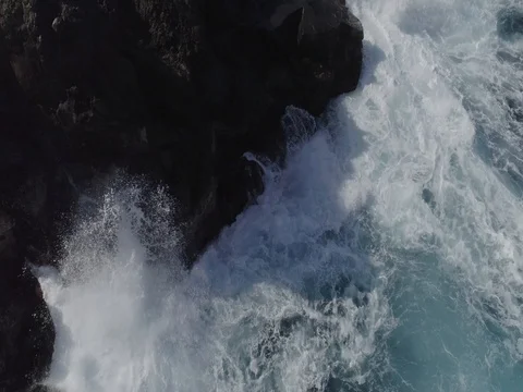 4k drone shot of oceanic powerful waves hitting rocks Stock Footage 83872755