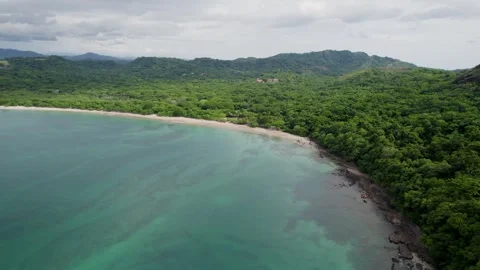 A 4K drone shot of Playa Conchal, or “Shell Beach”, and Puerto Viejo, next Stock Footage 257740465