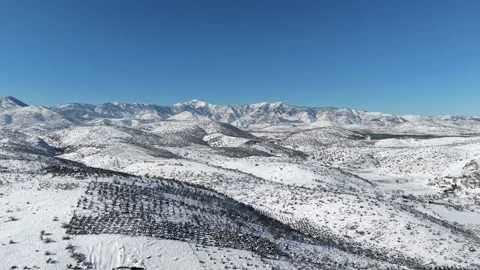 4k Drone shot of snow-capped mountains Video stock 328472398