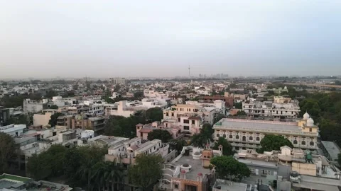 4K Drone Shots of a Sunset in an Indian City New Delhi above trees and Stock Footage 218998364