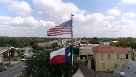 4K Drone Slow Motion Texas State Flag Fredericksburg Texas Stock Footage 118398628