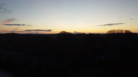 4K Drone Sunset Behind Tree Line Video stock 153841125