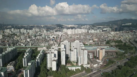 4K Drone of Surrounding Area of Gocheok Sky Dome Baseball Stadium and the Train Stock Footage 340860147