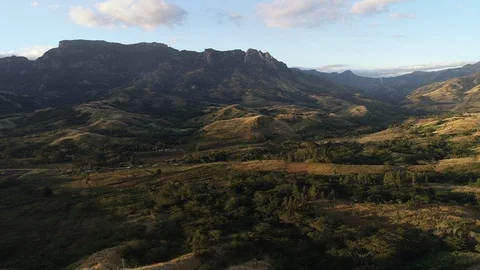 4k drone sweeping shot over Fiji mountain valley plateau at golden hour Video stock 94626591